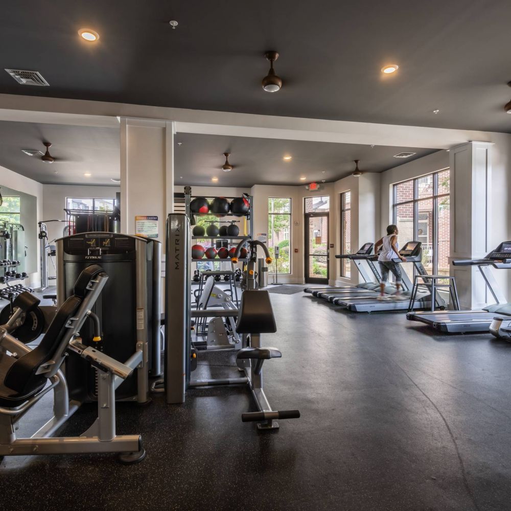 Apartments at Holly Crest expansive fitness center with cardio equipment