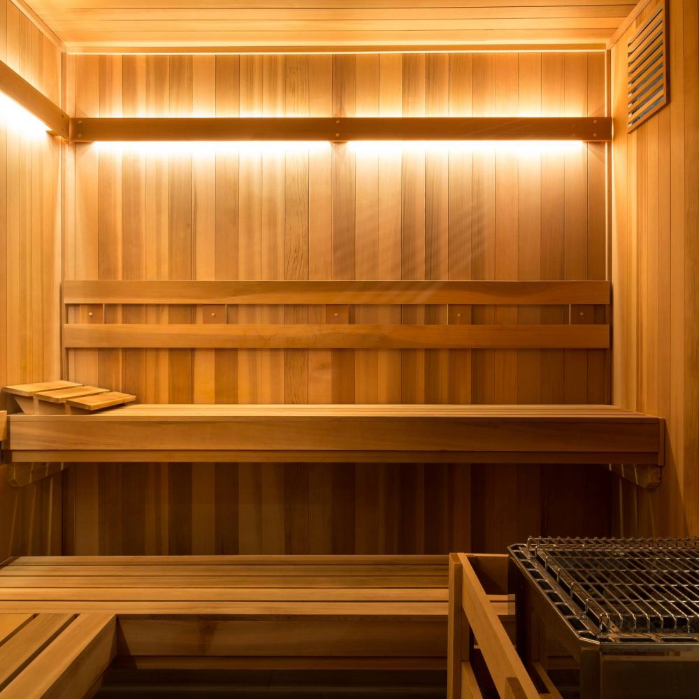 Apartments at Holly Crest Luxury dry Sauna amenity with wood paneling